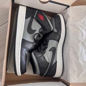 Air Jordan youth Black and White Sneakers with Red Accent. Worn once